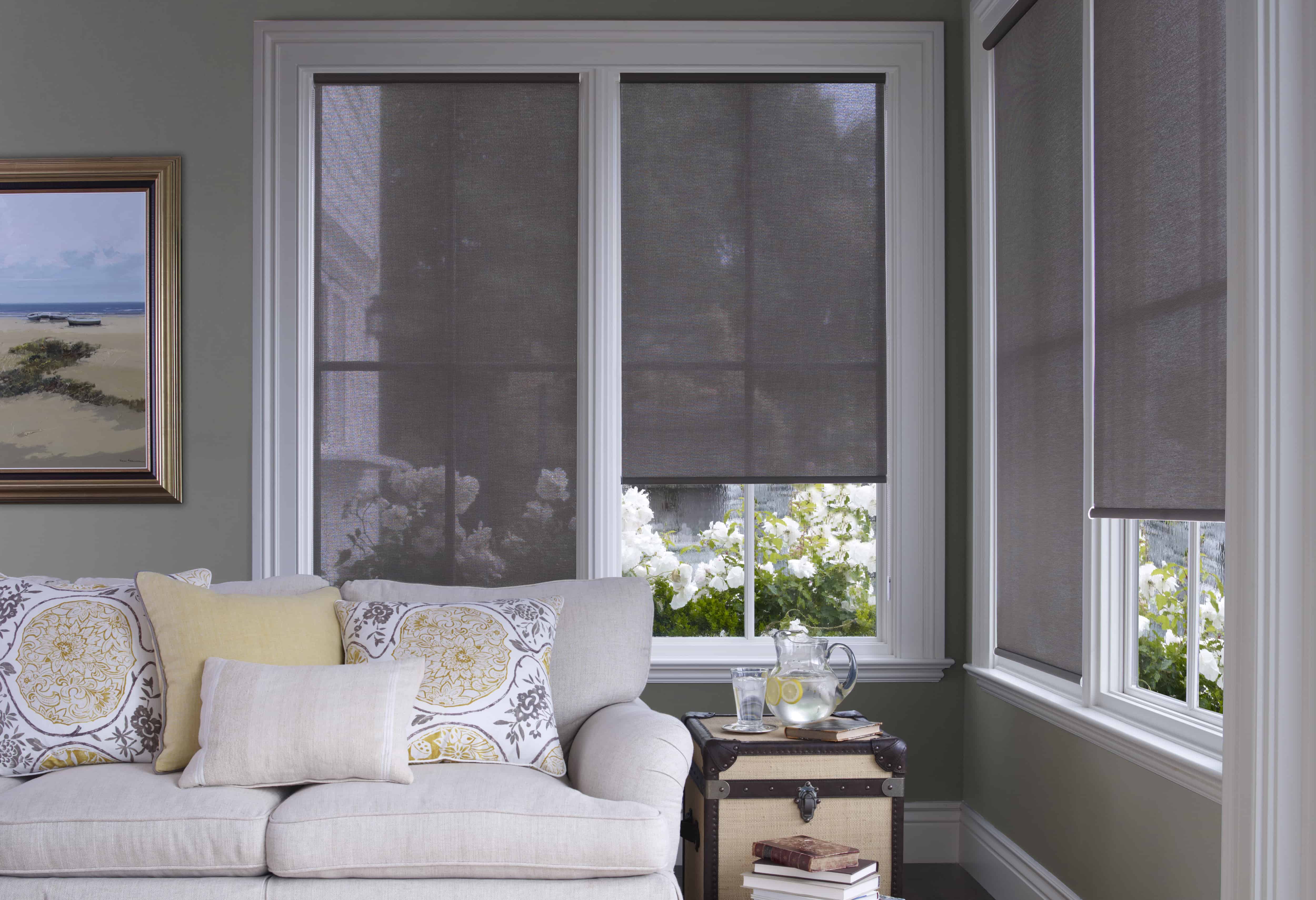 Modern living room with sleek roller shades